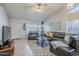 Spacious living room featuring a comfortable sectional sofa and modern decor at 4407 W Avenida Del Sol --, Glendale, AZ 85310