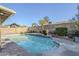 Backyard pool features tiled border and stonework offering a serene retreat for relaxation and enjoyment at 4407 W Avenida Del Sol --, Glendale, AZ 85310