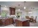 Well-appointed kitchen with granite counters, stainless appliances and ample cabinet space at 4443 W Acoma Dr, Glendale, AZ 85306