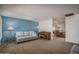 Inviting living room and dining room space with comfortable seating and a charming dining set at 4443 W Acoma Dr, Glendale, AZ 85306