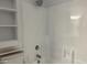 Clean bathroom with shower and shelf at 461 W Holmes Ave # 271, Mesa, AZ 85210
