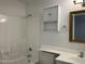 Bright bathroom showcasing a shower-tub combination, vanity with mirror and storage at 461 W Holmes Ave # 271, Mesa, AZ 85210