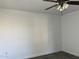 A bedroom featuring a ceiling fan and light-colored walls at 461 W Holmes Ave # 271, Mesa, AZ 85210
