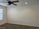 Unfurnished bedroom with vinyl floors and ceiling fan at 461 W Holmes Ave # 271, Mesa, AZ 85210