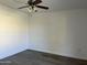 Unfurnished bedroom with vinyl floors, ceiling fan and ample space at 461 W Holmes Ave # 271, Mesa, AZ 85210