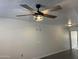 Living room featuring a modern ceiling fan fixture and tile flooring at 461 W Holmes Ave # 271, Mesa, AZ 85210