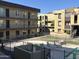 Exterior view of condo with fenced pool at 461 W Holmes Ave # 271, Mesa, AZ 85210