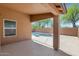 Pool view from covered patio with view of the well maintained backyard at 471 W Gascon Rd, San Tan Valley, AZ 85143