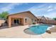 Inviting backyard oasis with private pool, covered patio, and well-maintained landscaping at 471 W Gascon Rd, San Tan Valley, AZ 85143