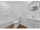 Stylish bathroom features a bathtub with shower and sleek modern vanity at 471 W Gascon Rd, San Tan Valley, AZ 85143