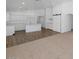 Open-concept living space with modern fixtures, wood floors, and ample natural light at 471 W Gascon Rd, San Tan Valley, AZ 85143