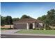 Charming single-story home with a tile roof, two-car garage, and low-maintenance desert landscaping at 4720 E Amethyst Ln, San Tan Valley, AZ 85143
