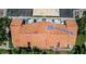 Aerial view of a well-maintained townhome community with tile roofs, and designated resident parking at 500 N Roosevelt Ave # 26, Chandler, AZ 85226