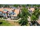 Charming townhome featuring a tree lined walkway and spacious front yard in a well-maintained community at 500 N Roosevelt Ave # 26, Chandler, AZ 85226