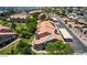 Charming townhome featuring landscaped front yard, tile roof, and assigned covered parking in a well-maintained community at 500 N Roosevelt Ave # 26, Chandler, AZ 85226