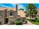 Townhome with a red tile roof and lush landscaping, creating a warm and inviting curb appeal at 500 N Roosevelt Ave # 26, Chandler, AZ 85226