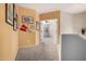 Upstairs hallway featuring beige carpeting and school spirit decor at 500 N Roosevelt Ave # 26, Chandler, AZ 85226