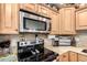 Well-equipped kitchen featuring stainless steel appliances and granite countertops at 500 N Roosevelt Ave # 26, Chandler, AZ 85226