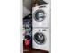 Convenient laundry closet with stacked washer and dryer units at 500 N Roosevelt Ave # 26, Chandler, AZ 85226