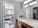 Bathroom features a bathtub, double vanity, and natural light at 5020 E Dallas St, Mesa, AZ 85205