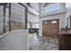 Grand foyer with marble flooring and modern staircase leads to a spacious living area at 5020 E Dallas St, Mesa, AZ 85205