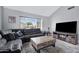 Inviting living room featuring a fireplace, TV console and comfortable seating at 5020 E Dallas St, Mesa, AZ 85205