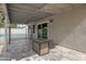 Outdoor patio with a fire table and poolside view, ideal for relaxing or entertaining at 5020 E Dallas St, Mesa, AZ 85205