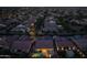 Dusk aerial view of a residential neighborhood with a private pool and patio at 5250 S Wesley Cir, Mesa, AZ 85212