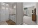 Elegant bathroom shows a granite vanity, modern shower and a view into the main bedroom at 5250 S Wesley Cir, Mesa, AZ 85212