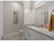 Well-lit bathroom with granite countertops, and modern fixtures at 5250 S Wesley Cir, Mesa, AZ 85212