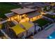 Aerial view of clubhouse with firepit, pool, turf area, and shade structures at 5250 S Wesley Cir, Mesa, AZ 85212
