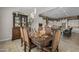 Beautiful dining room adjacent to the kitchen, featuring elegant decor and ample space for entertaining guests at 5250 S Wesley Cir, Mesa, AZ 85212