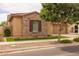 Inviting exterior view showcasing a charming house with well-maintained landscaping and a beautiful stone facade at 5250 S Wesley Cir, Mesa, AZ 85212