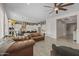 Comfortable living room flowing into the kitchen, boasting stylish decor and an open, airy atmosphere at 5250 S Wesley Cir, Mesa, AZ 85212