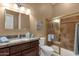Nicely tiled bathroom with granite counters and standing shower at 5342 S Citrus Ct, Gilbert, AZ 85298