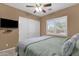 Neutral toned bedroom with closet and exterior window at 5342 S Citrus Ct, Gilbert, AZ 85298