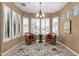 Charming breakfast nook bathed in natural light with plantation shutters at 5342 S Citrus Ct, Gilbert, AZ 85298