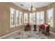 Bright breakfast nook featuring large windows and comfortable seating with a view at 5342 S Citrus Ct, Gilbert, AZ 85298