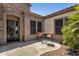 Cozy front porch area featuring a table and chairs, perfect for enjoying outdoor relaxation at 5342 S Citrus Ct, Gilbert, AZ 85298