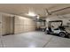 Spacious garage with storage cabinets, and a golf cart at 5342 S Citrus Ct, Gilbert, AZ 85298