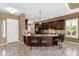 Well-equipped kitchen with dark wood cabinets, granite countertops, and tile flooring at 5342 S Citrus Ct, Gilbert, AZ 85298