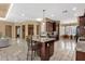 Spacious kitchen featuring a central island with bar seating and ample storage at 5342 S Citrus Ct, Gilbert, AZ 85298