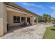 Covered patio with outdoor seating, ceiling fan, and access to the pool area at 5342 S Citrus Ct, Gilbert, AZ 85298