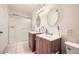 Bright bathroom boasts double sinks and a tub/shower, offering a functional space at 6304 N 47Th Ave, Glendale, AZ 85301