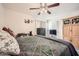 Cozy bedroom featuring comfortable queen bed and ceiling fan, perfect for relaxing or sleeping at 6304 N 47Th Ave, Glendale, AZ 85301