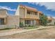 Charming two-story townhouse with stucco exterior and red tile roof at 6304 N 47Th Ave, Glendale, AZ 85301