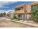 This stucco home boasts a red tile roof and balcony, offering curb appeal and outdoor living space at 6304 N 47Th Ave, Glendale, AZ 85301