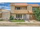 Charming two-story townhouse with stucco exterior and red tile roof at 6304 N 47Th Ave, Glendale, AZ 85301