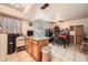 Bright kitchen with a center island and dining space at 6304 N 47Th Ave, Glendale, AZ 85301