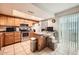 Bright kitchen featuring wooden cabinets and modern appliances at 6304 N 47Th Ave, Glendale, AZ 85301